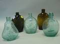 Five Blown Molded Colored Glass Flasks