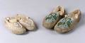 Two Pairs of Woodlands Beaded Hide Moccasins