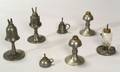 Seven Assorted Pewter Lamps