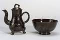 Two Staffordshire Black Glazed Earthenware Items