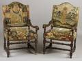 Two Continental Baroque Walnut Tapestry Upholstered Armchairs
