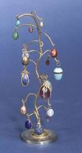 Gilt Metal Trees Suspending Seventeen Miniature Eggs