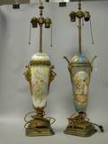 Two Giltmetal Mounted Sevresstyle Gilt and Scenic Decorated Porcelain Table Lamps