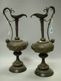 Pair of Renaissance Revival Patinated Cast Metal Ewers