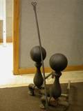 Wrought Iron Rams Head Peel and a Large Pair of Cast Iron Balltop Andirons