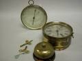 Seth Thomas Brass Ships Bell Clock and an Aitchison  Co Brass Barometer