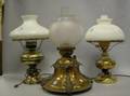 Three Brass and Glass Kerosene Table Lamps