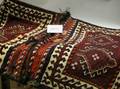 Collection of Assorted Rugs Weavings and Pillows