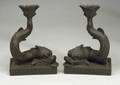 Pair of Wedgwood Black Basalt Dolphin Candlesticks