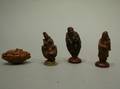 Four Chinese Carved Peach Pit Figures