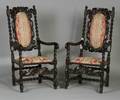 Pair of Jacobean Revival Carved Walnut Open Armchairs