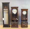Two International Time Recording clocks with oak cases