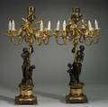 Pair of Louis XVstyle Bronze Parcel Gilt Figural Six Light Candelabra after Clodion