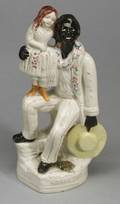 Staffordshire Figure of Uncle Tom and Eva