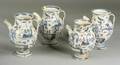 Four Italian Blue and White Earthenware Jugs