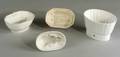 Group of Ten White Earthenware Kitchen Molds