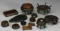 Approximately Fifteen Chinese Carved Hardwood Stands