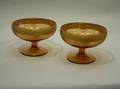 Pair of Continental Parcelgilt Amber Glass Footed Bowls