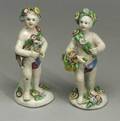 Pair of Bowtype Porcelain Figures of Putti