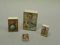 Four Small Paper Boxes with Lithographed Covers