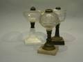 Three Assorted Pressed Glass Fluid Lamps