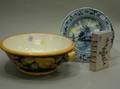 Tiffany  Co Faience Bookform Bank a Delft Bowl and a Faience Bowl