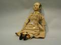 Antiquestyle Carved and Painted Doll with Muslin Dress