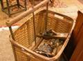 Six Wooden and Iron Trade and Domestic Tools Woven Splint Storage Basket and an Antler Mounted Carved Wood Wall Plaque
