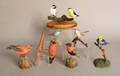 Group of 7 songbird carvings