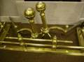 Pair of Brass Balltop Spiral Andirons and a Brass Fireplace Fender