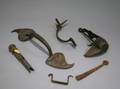 Seven Pieces of Wrought Iron Hardware and Lighting