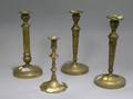 Four Brass Candlesticks