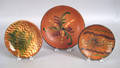 Three redware plates