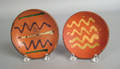Two redware toddy plates