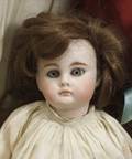 Small Closed Mouth Bisque Socket Head Doll