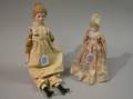 Two Bisque Shoulder Head Dolls with Molded Hair