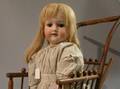 AM Bisque Head Doll in Wicker Carriage