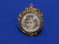 Gilt Mounted Miniature Portrait on Ivory of a Child