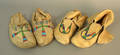 Two pair of Native American beaded hide moccasins