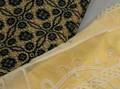 Jacquard Coverlet and a Yellow Satin and Lace Bed Cover