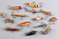 Fourteen wood fishing lures earlymid 20th c
