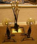 Pair of Brass Mounted Cast Iron Andirons with a Stand and Set of Four Hearth Tools