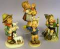 Four Hummel Ceramic Figures
