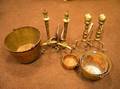 Two Pairs of Brass Andirons Three Brass and Wrought Iron Kettles and a Copper Pan
