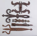 Two decorative wrought iron hinges late 18thearly 19th c