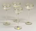 Set of Four Peter Behrens Gilt Colorless Glass Champagne Glasses