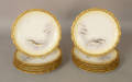 Set of twelve Limoges fish plates