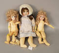 Three bisque dolls