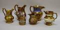 Six Assorted Decorated Copper Lustre Pitchers