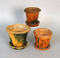 Three redware flower pots